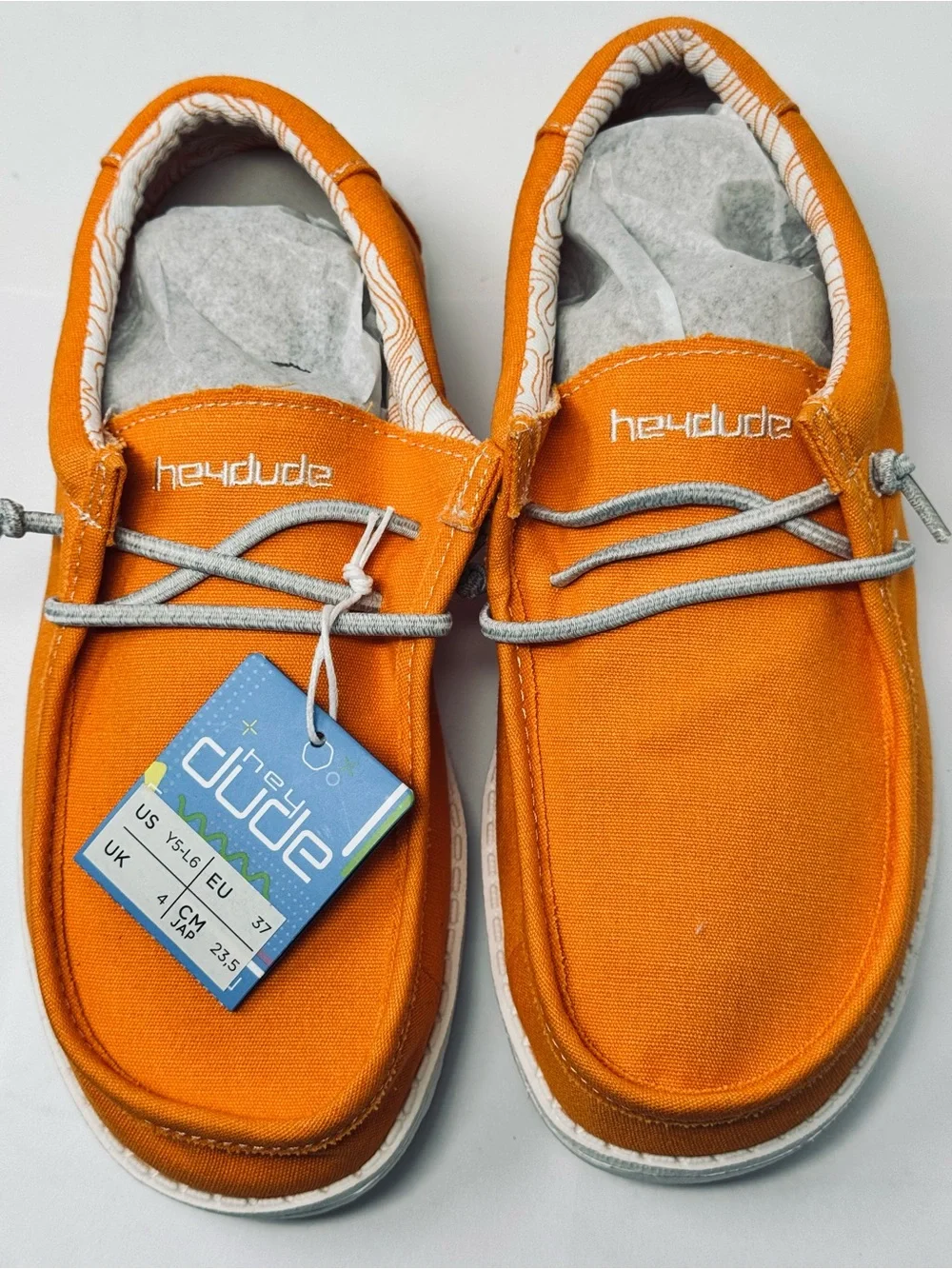 NEW Hey Dude Fiesta Orange Youth Size 5 Women Size 7 Canvas Casual Slip-Ons WTAG